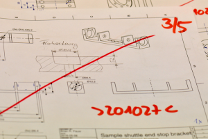 Drawing after discussion. Note the added cross-sectional view.