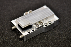 The finished, assembled crystal holder. Note the extra curves at the corners, allowed there to simplify machining.